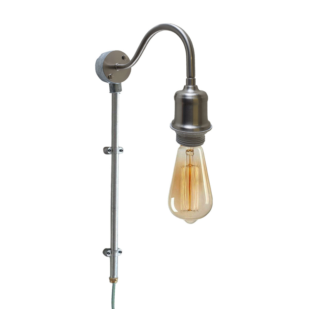 Vintage conduit pipe wall light with dimmer switch and fabric flex cable, showcasing a unique antique design.