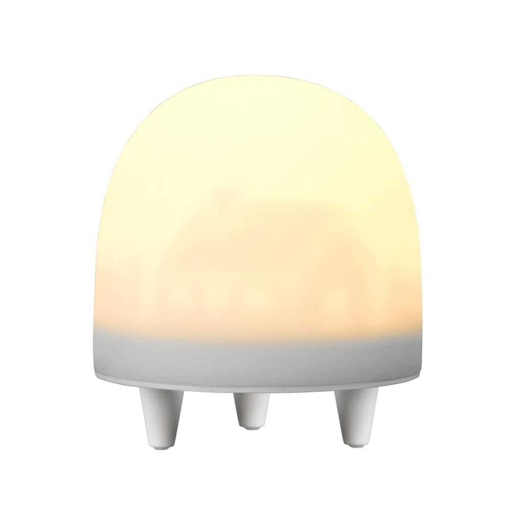 Cute silicone night light for kids, featuring colorful light modes and a soft design, perfect for bedtime use.