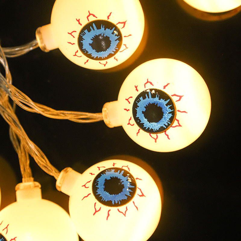 A string of 10 LED eyeball lights, perfect for Halloween decorations, featuring spooky eyeball designs in various colors.