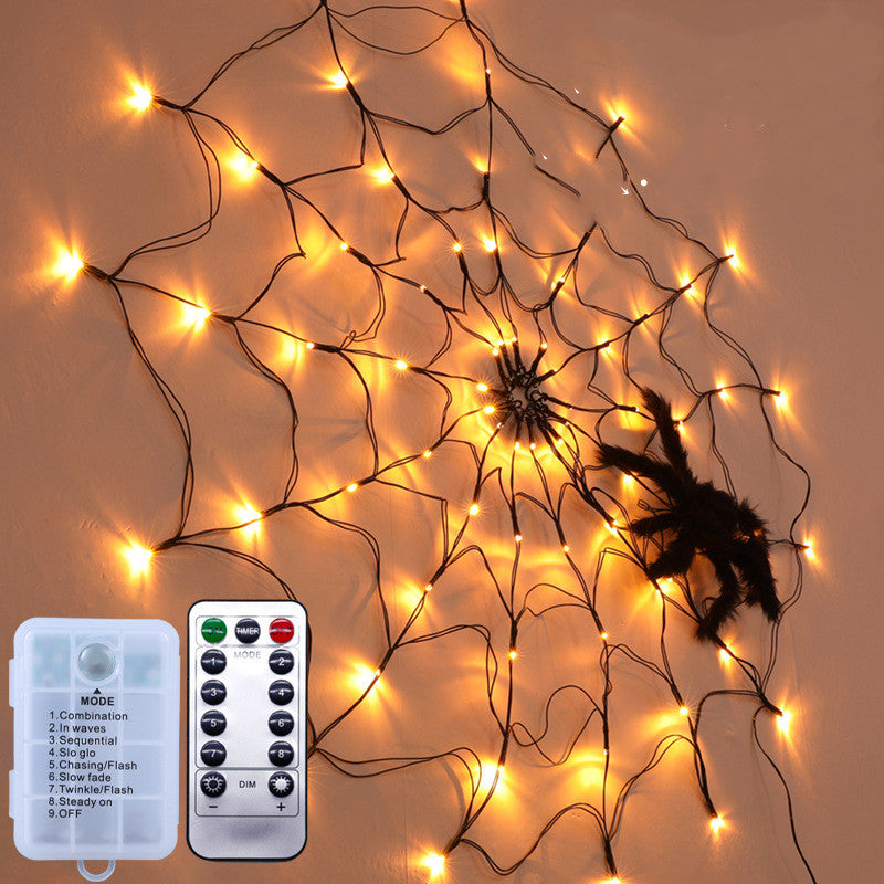 Halloween LED Spider Web String Light with remote control, featuring a giant web, 70 LED lights, and a realistic spider for spooky decorations.