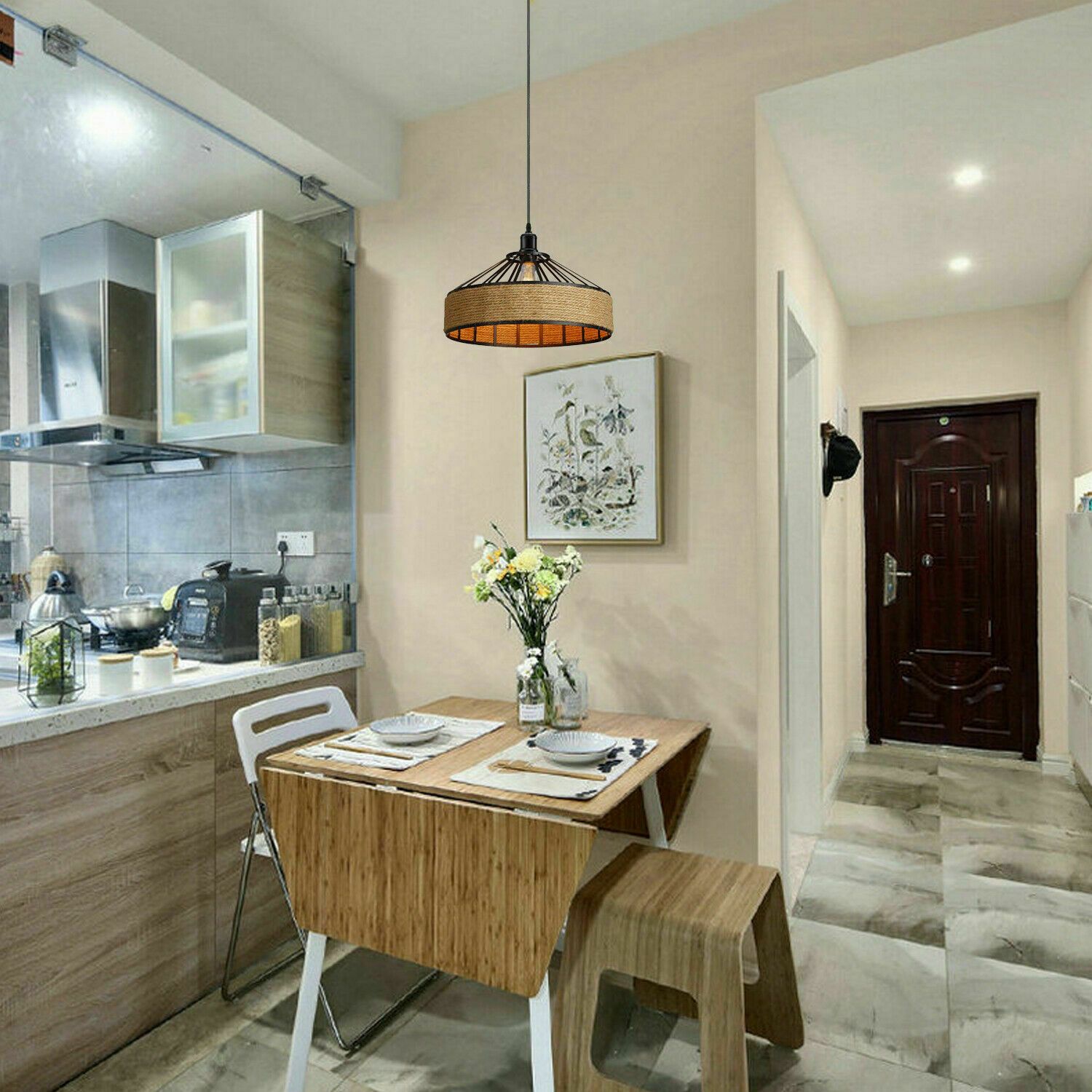 Hanging pendant light covered in natural hemp rope, featuring a black metal base and a 95cm cable, ideal for home and cafe decor.