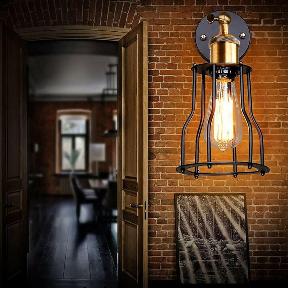 Industrial black wall light fitting with adjustable arm, showcasing a rustic design suitable for modern interiors.