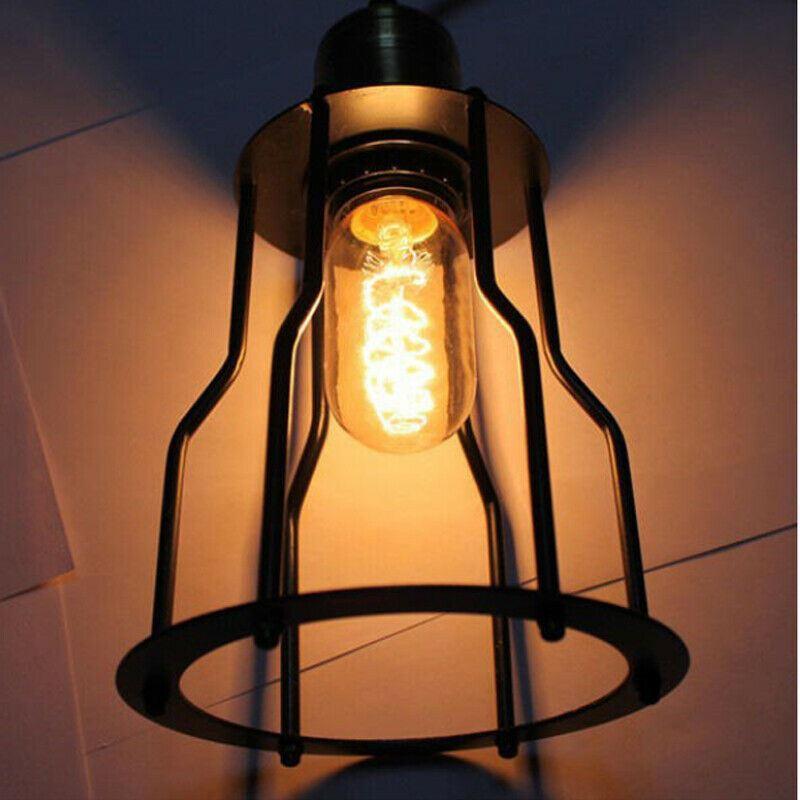 Industrial black wall light fitting with adjustable arm, showcasing a rustic design suitable for modern interiors.