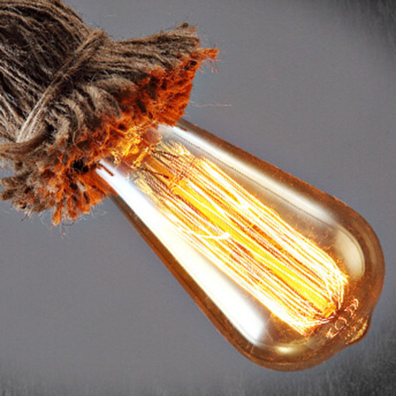 Industrial hanging hemp rope pendant light showcasing vintage design with a hemp shade and adjustable cable.