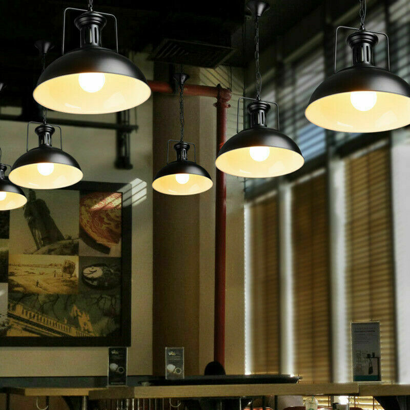 Industrial vintage metal adjustable hanging ceiling light with black exterior and white inner shade, perfect for modern and retro interiors.