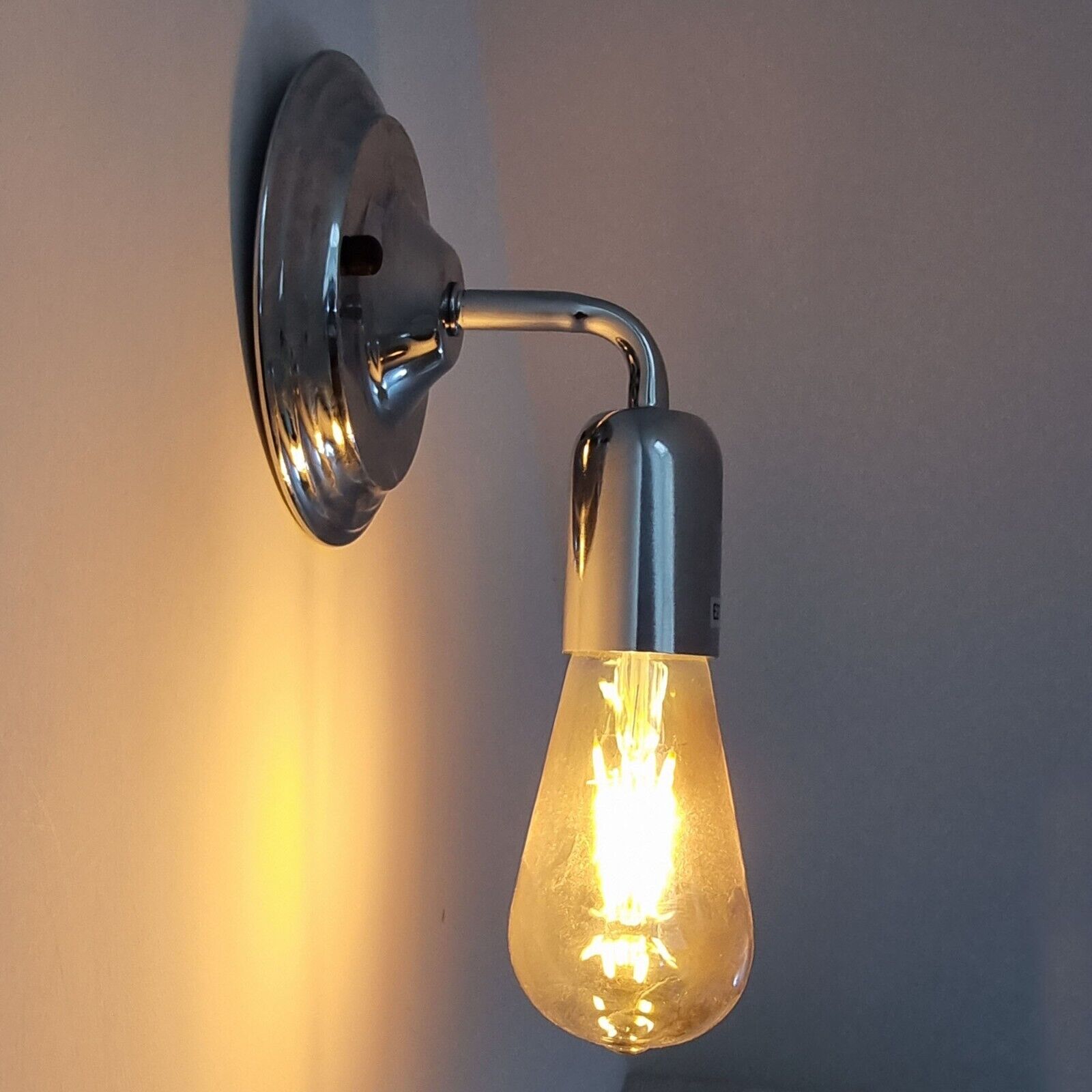 Industrial Vintage Retro Polished Sconce Chrome Wall Light showcasing its elegant design and polished finish, perfect for indoor decor.