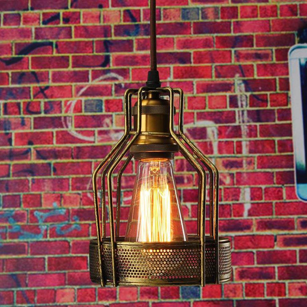 Modern brass chandelier pendant light with black fabric wire, showcasing vintage charm and industrial design.