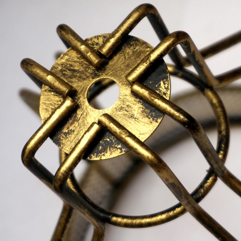 Modern brass chandelier pendant light with black fabric wire, showcasing vintage charm and industrial design.