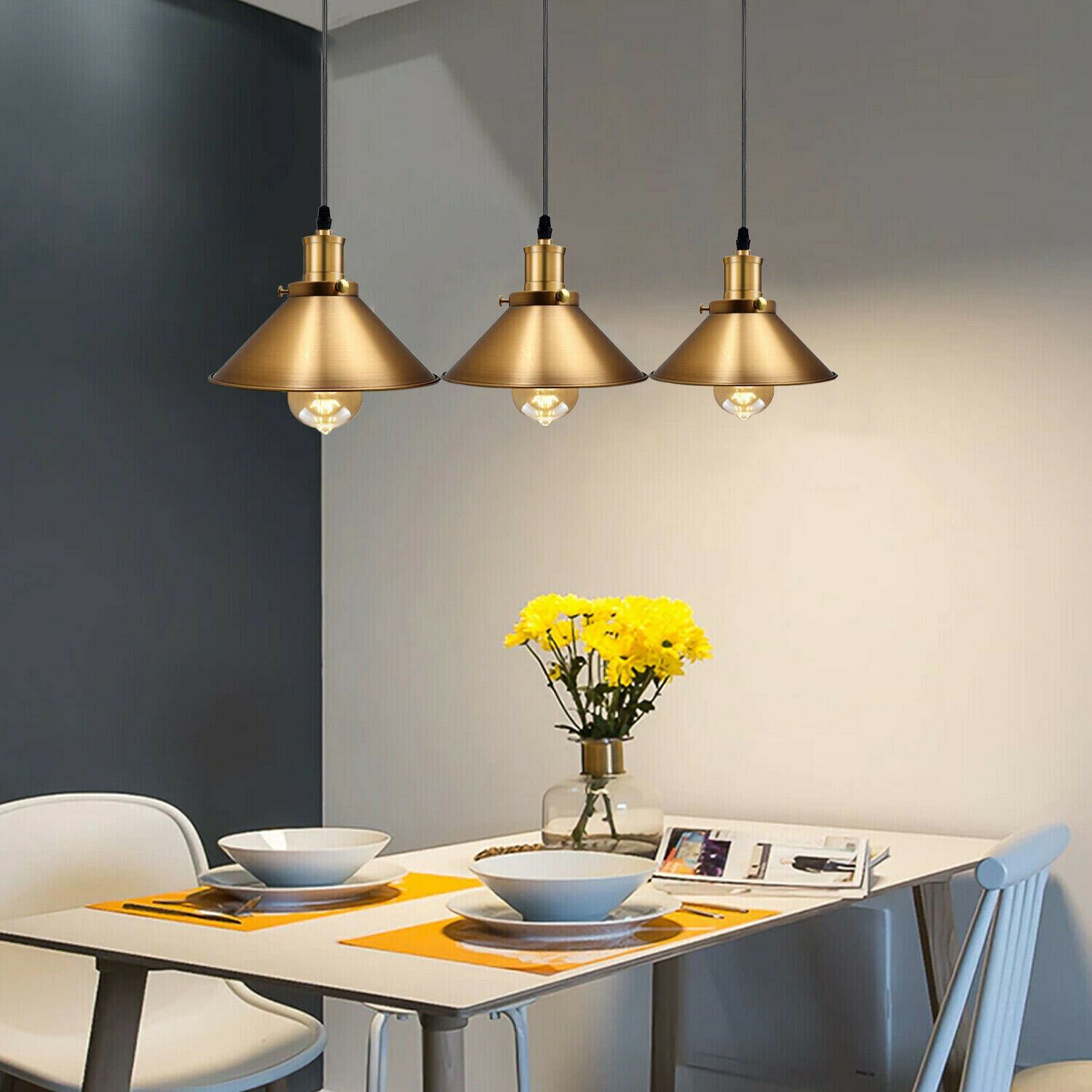 Modern Industrial Style Metal Cage Single Pendant Light in Yellow Brass, featuring a sleek dome design and adjustable hood.