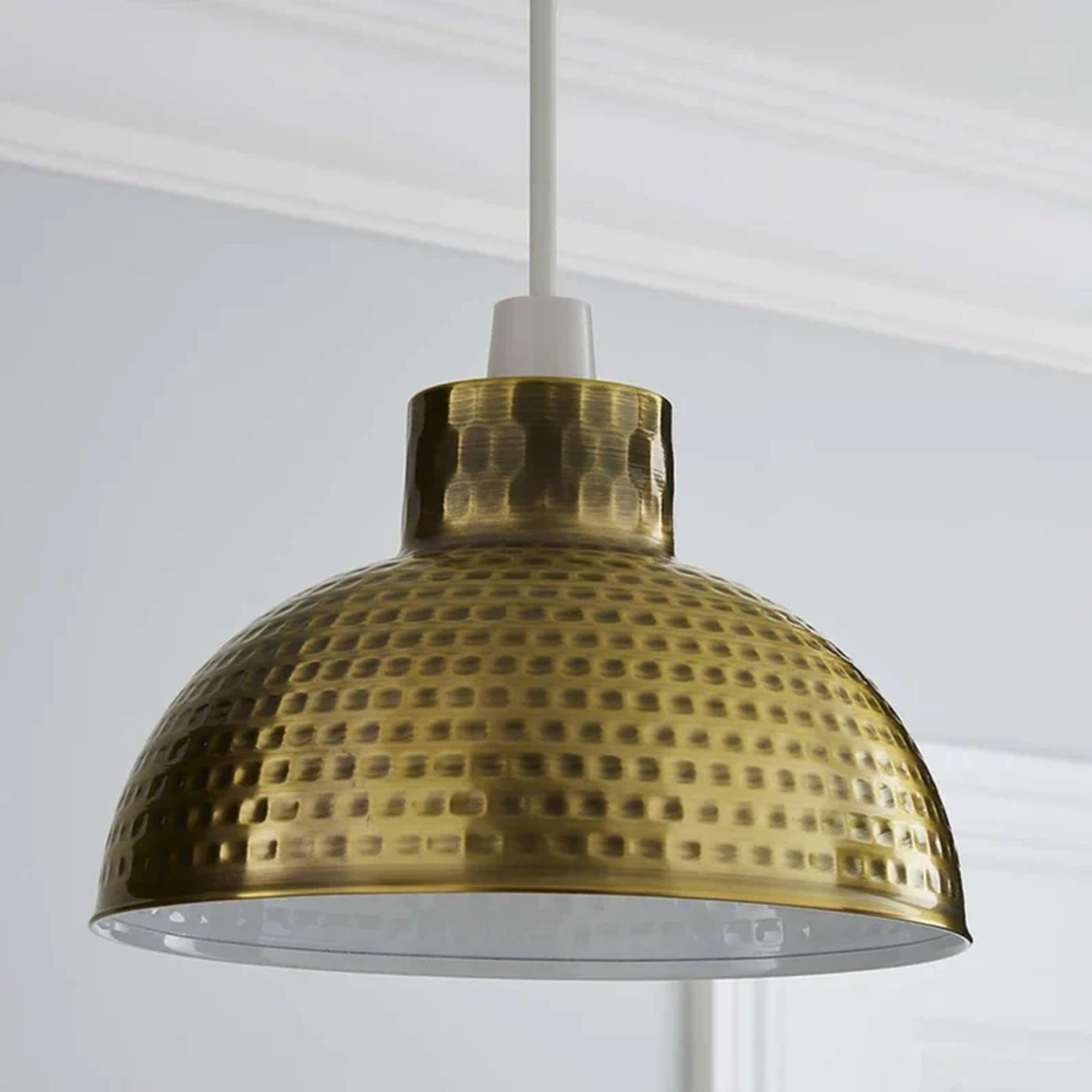 Modern yellow brass lamp shade with glossy finish, designed for easy installation on ceiling pendants.