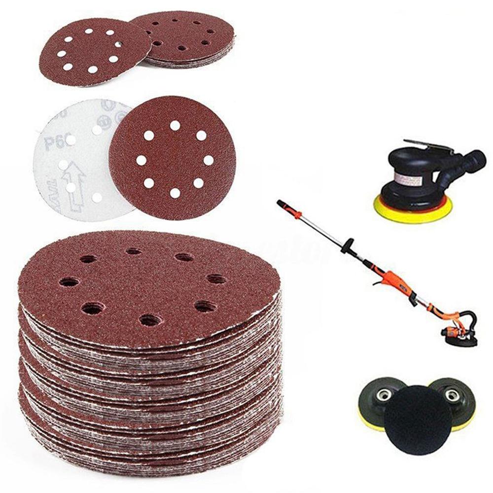 P-120 5 inch 8 Hole Sanding Discs made of aluminum oxide, ideal for sanding metal, wood, and jade surfaces.