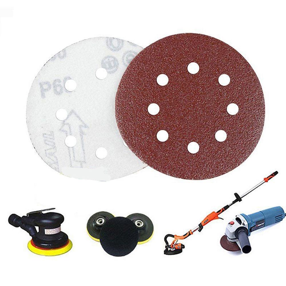 P-120 5 inch 8 Hole Sanding Discs made of aluminum oxide, ideal for sanding metal, wood, and jade surfaces.