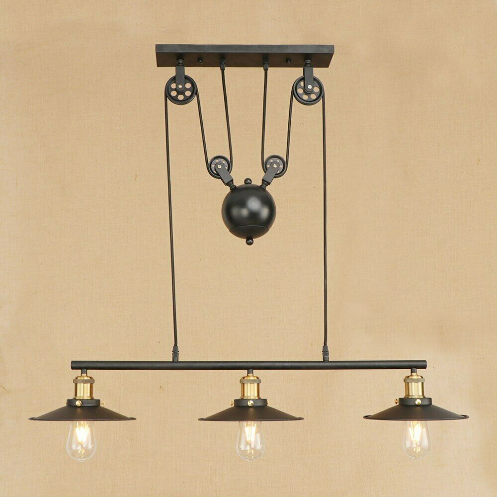 E27 Vintage Pulley Pendant Pipe Light with three bulbs, black and brass finish, adjustable height, ideal for indoor use.
