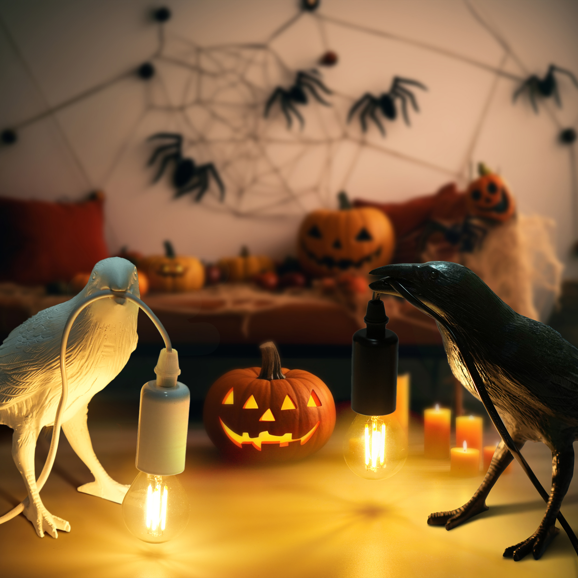 A stylish raven desk lamp with a crow design, featuring an open beak holding the lamp cord, perfect for Halloween decor.