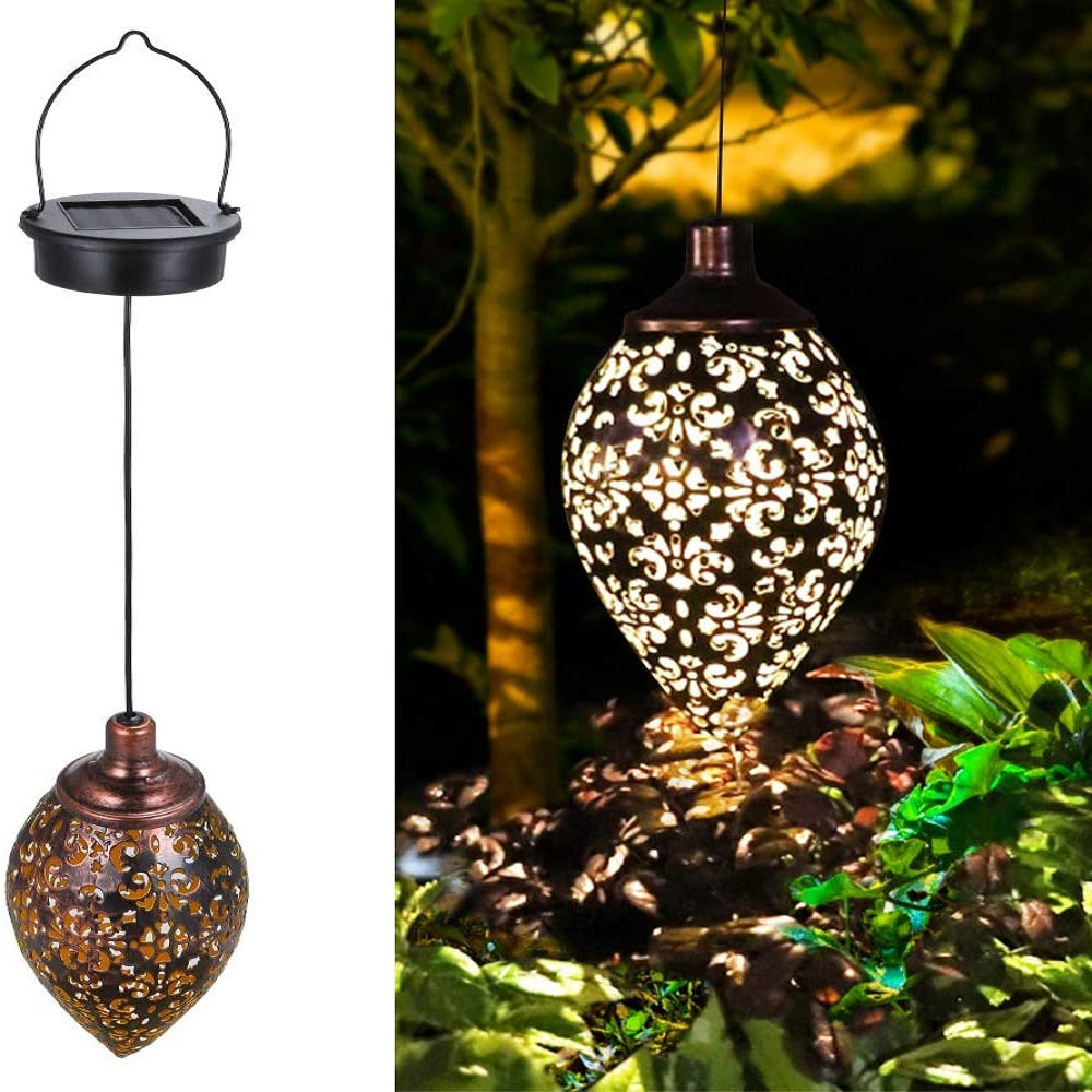 A beautiful solar light LED lantern garland hanging outdoors, showcasing its warm white glow and waterproof design, perfect for garden decoration.