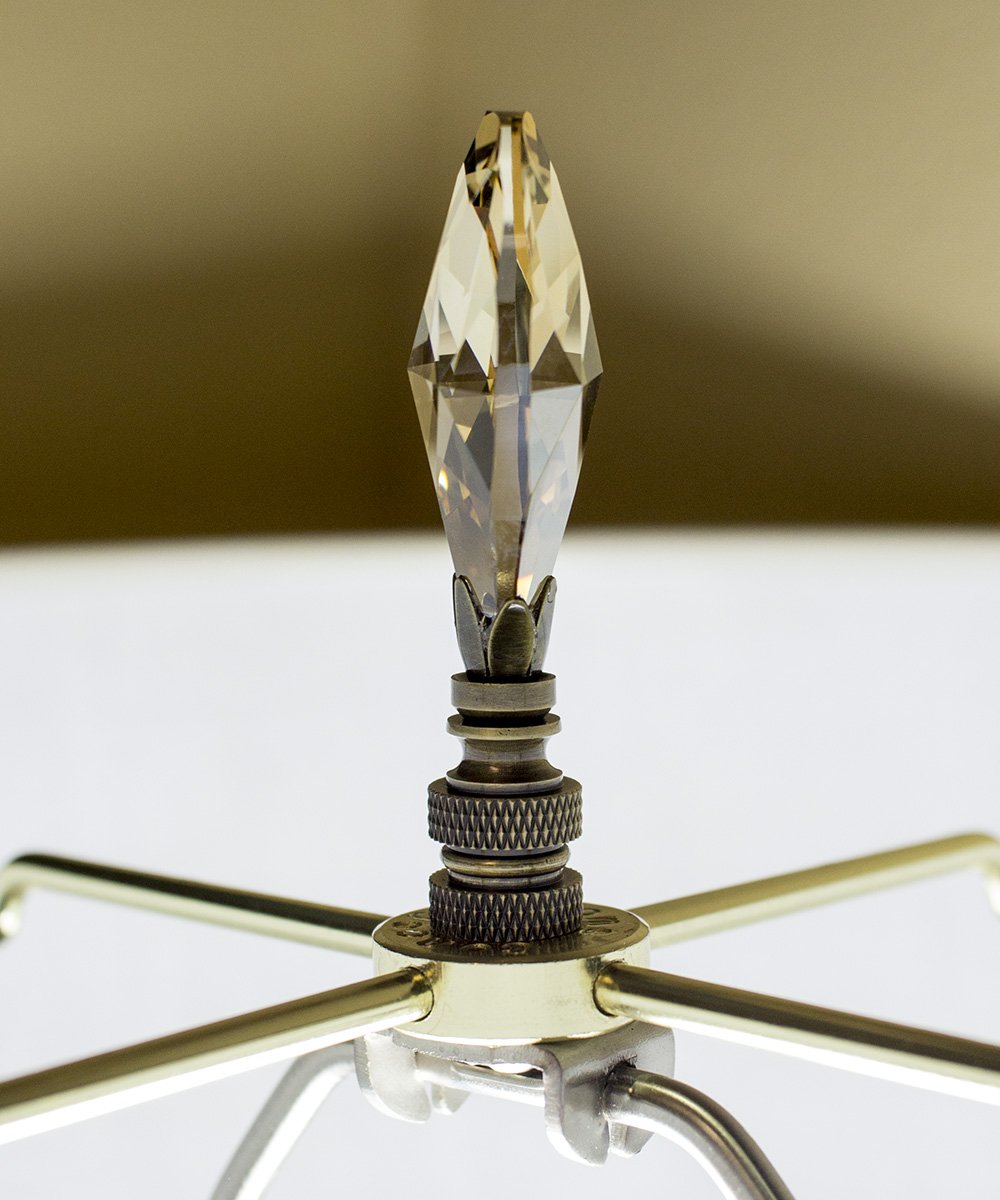 Stephanov Large Champagne Crystal Teardrops Lamp Finial in Antique Brass, showcasing a teardrop shape with a dusty rose hue and a classic brass base.