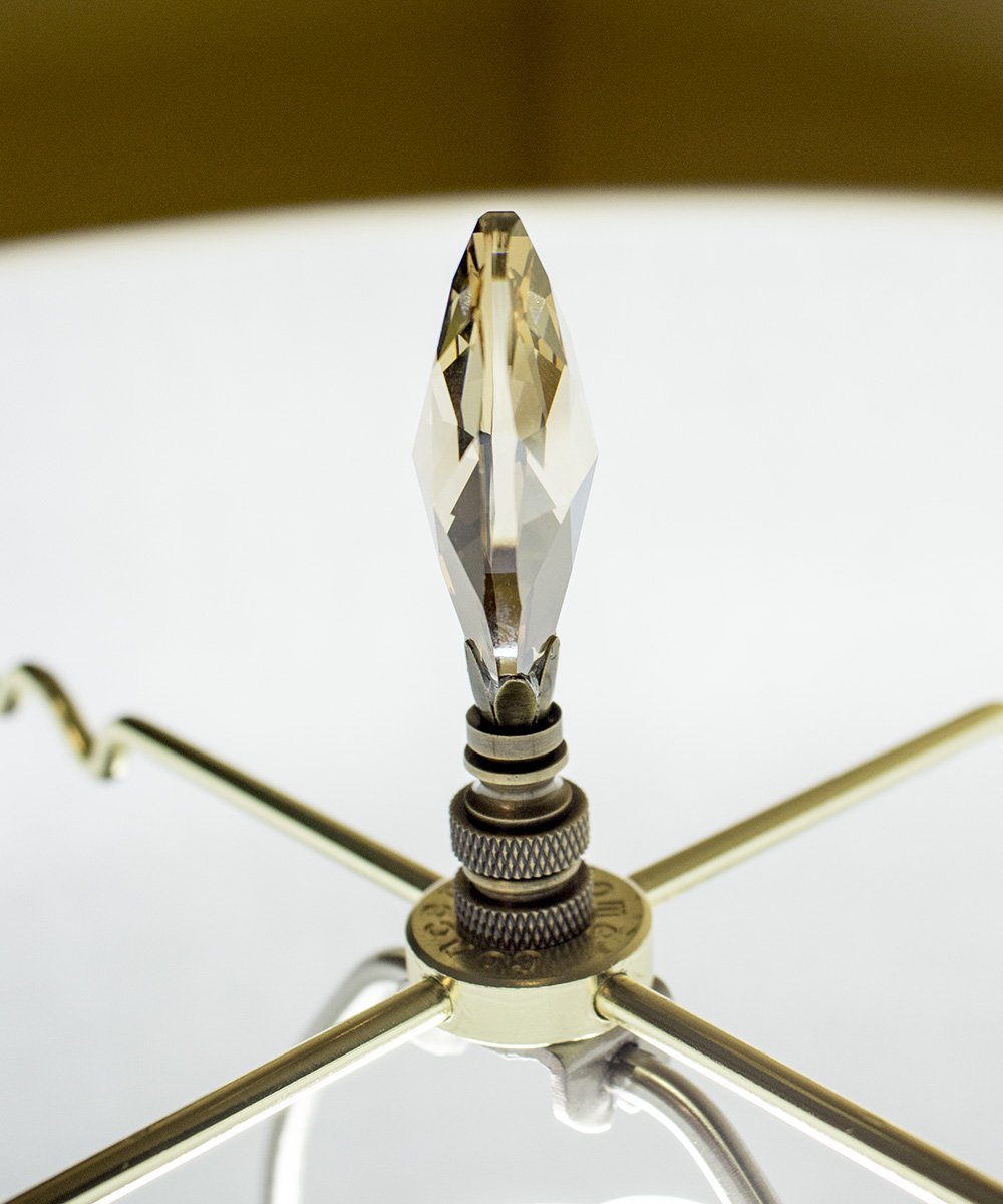 Stephanov Large Champagne Crystal Teardrops Lamp Finial in Antique Brass, showcasing a teardrop shape with a dusty rose hue and a classic brass base.