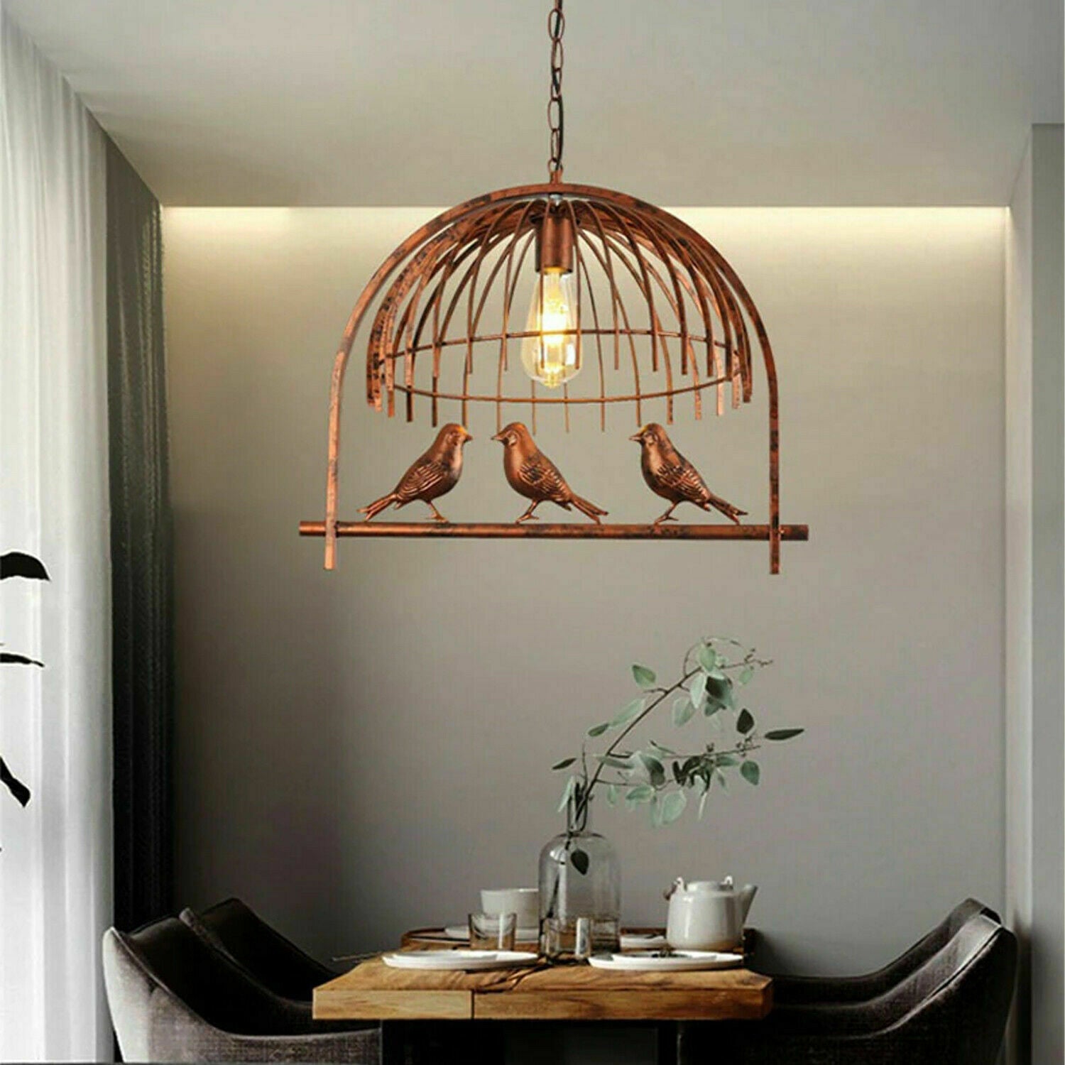 Vintage Bird Cage Chandelier Pendant Light showcasing intricate design and elegant finish, perfect for home decor.