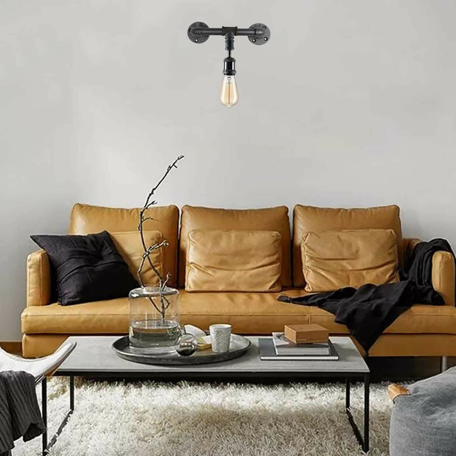 Vintage Industrial Pipe Light showcasing rustic steampunk design with galvanized iron finish, perfect for wall mounting in various indoor spaces.