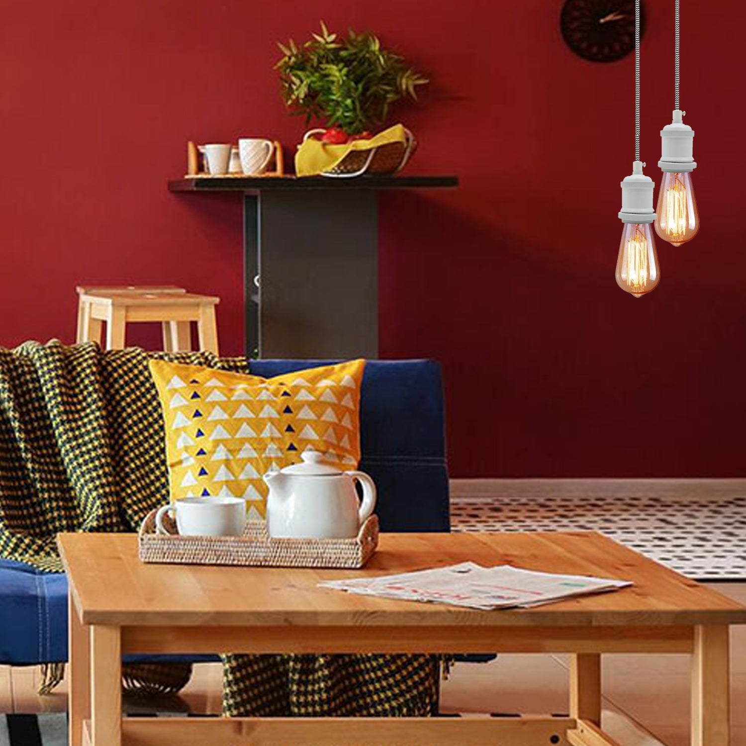 Vintage white metal ceiling fitting with black and white braided flex, showcasing a stylish pendant light design.