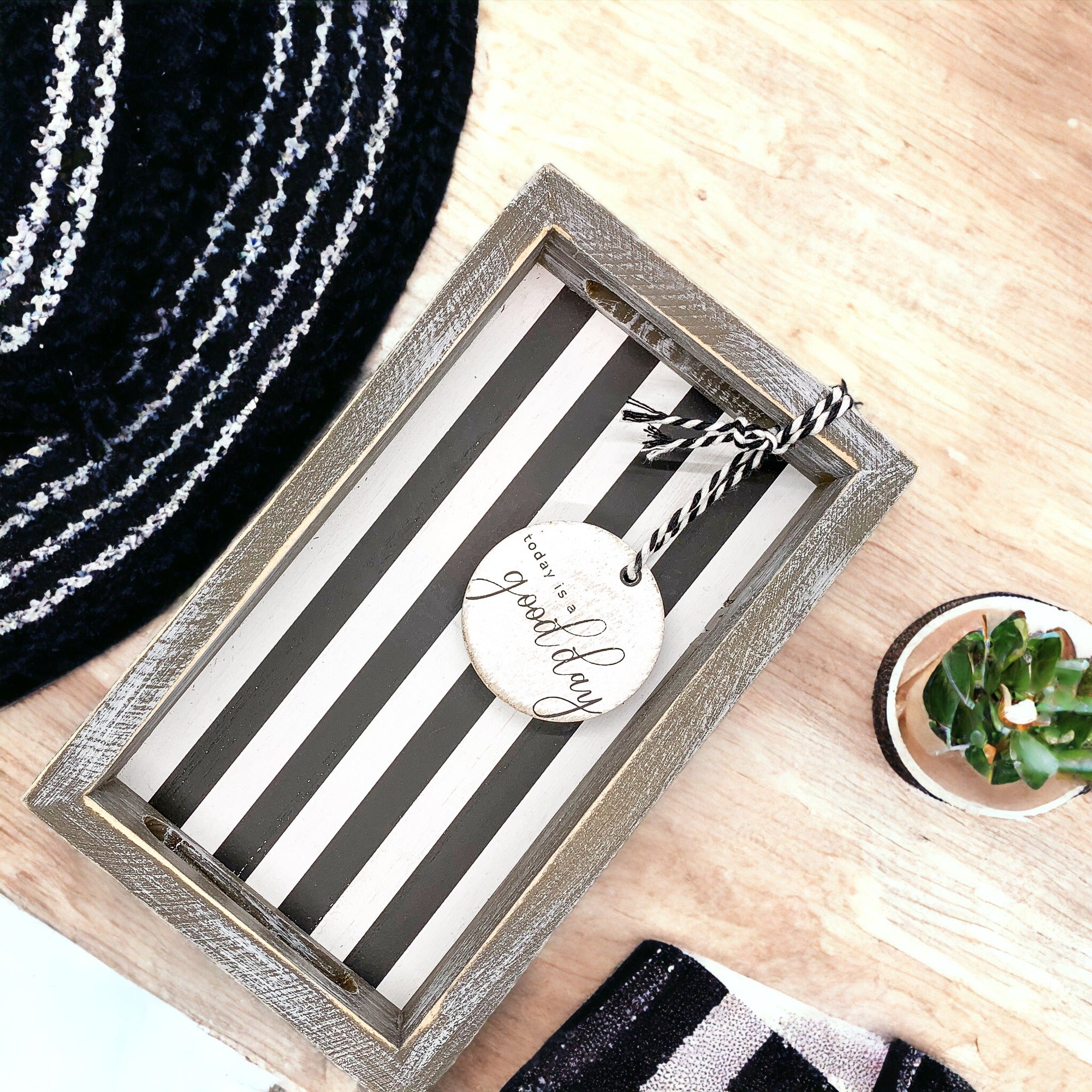 Good Day Stripes wooden tray featuring a black and white design with the phrase 'Today is a good day' on one side.