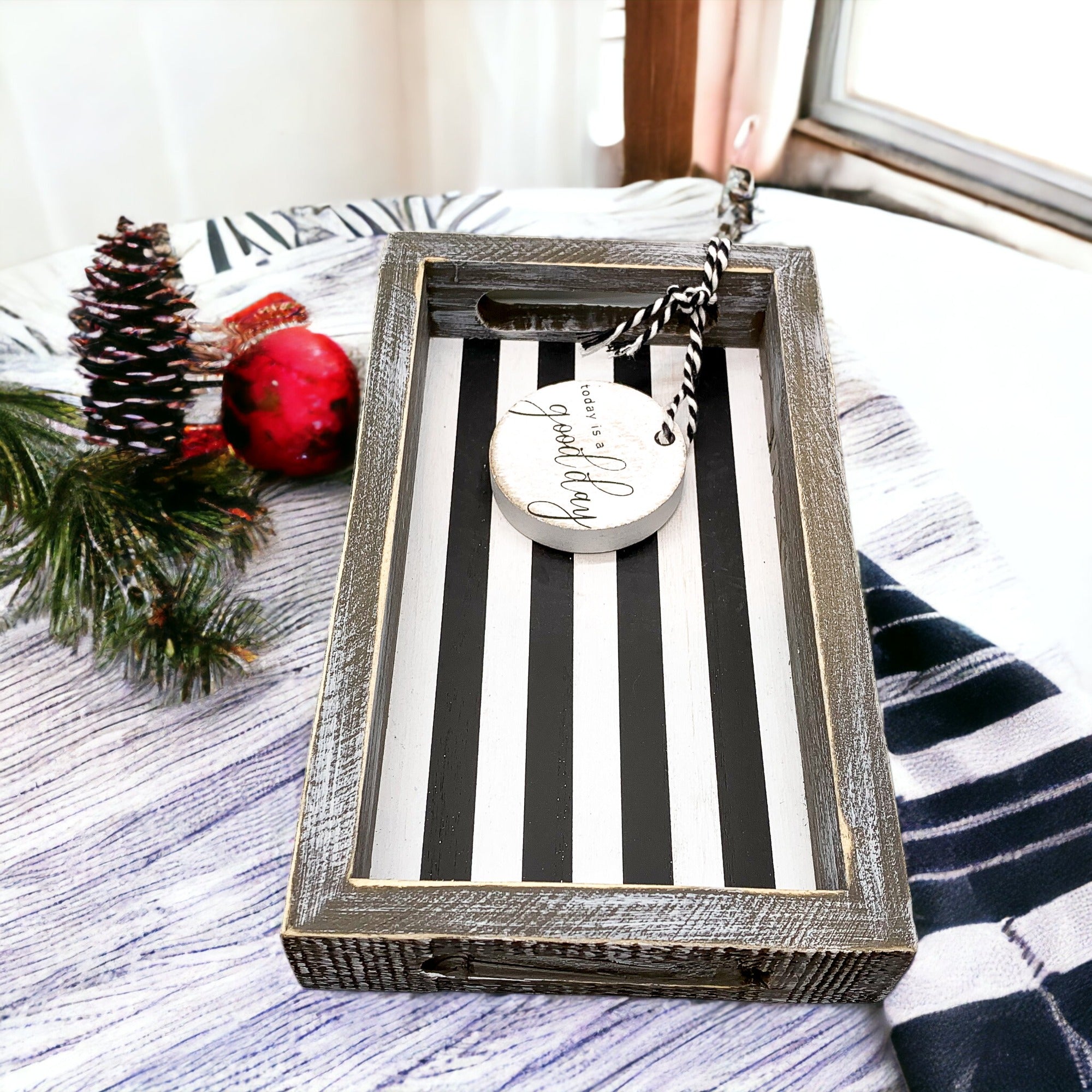 Good Day Stripes wooden tray featuring a black and white design with the phrase 'Today is a good day' on one side.