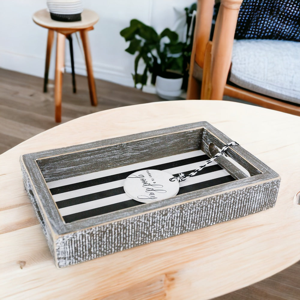 Good Day Stripes wooden tray featuring a black and white design with the phrase 'Today is a good day' on one side.