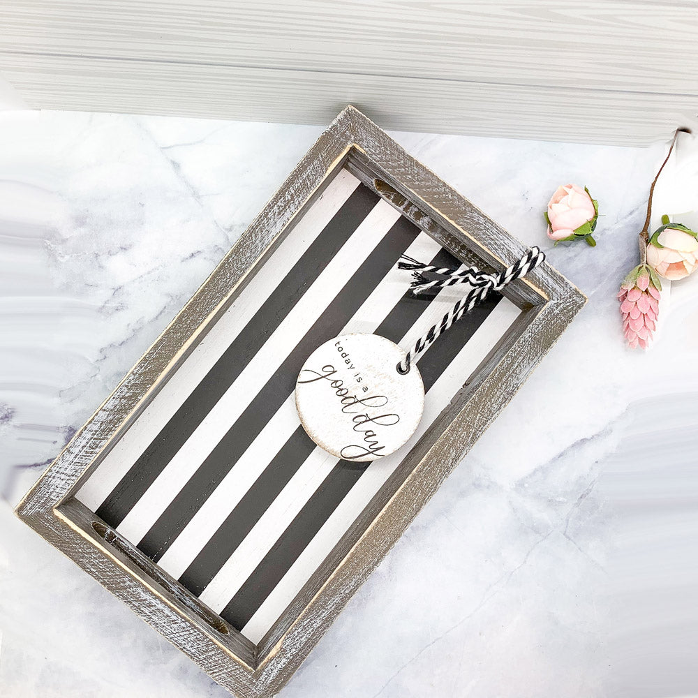 Good Day Stripes wooden tray featuring a black and white design with the phrase 'Today is a good day' on one side.