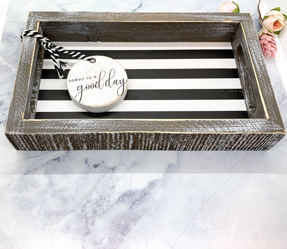 Good Day Stripes wooden tray featuring a black and white design with the phrase 'Today is a good day' on one side.