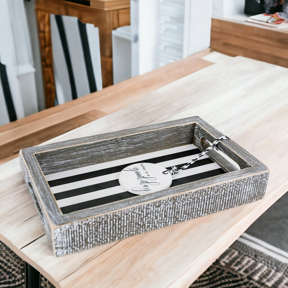 Good Day Stripes wooden tray featuring a black and white design with the phrase 'Today is a good day' on one side.