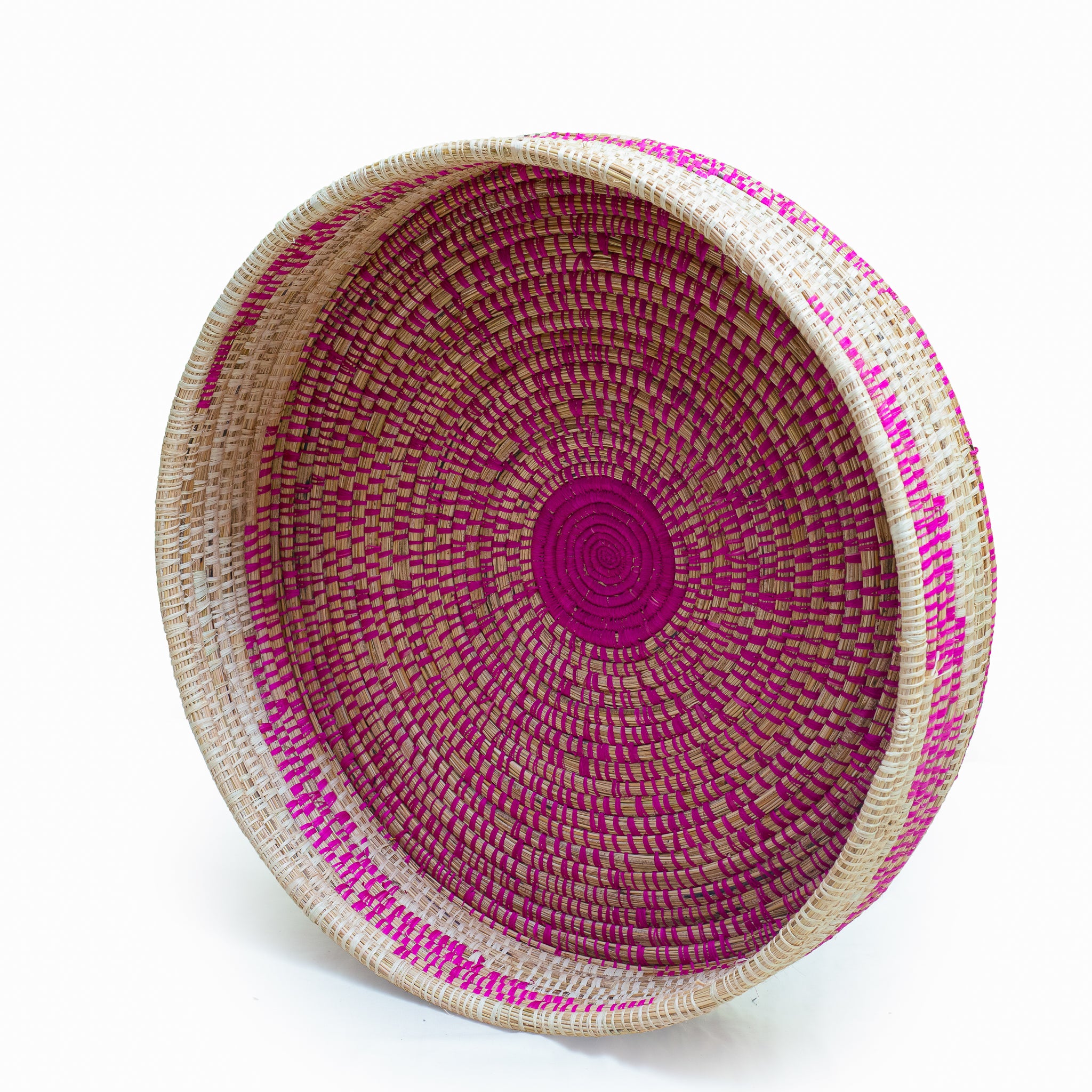 A beautifully handwoven Nairobi bowl showcasing vibrant colors and authentic African design, perfect for home decor and storage.