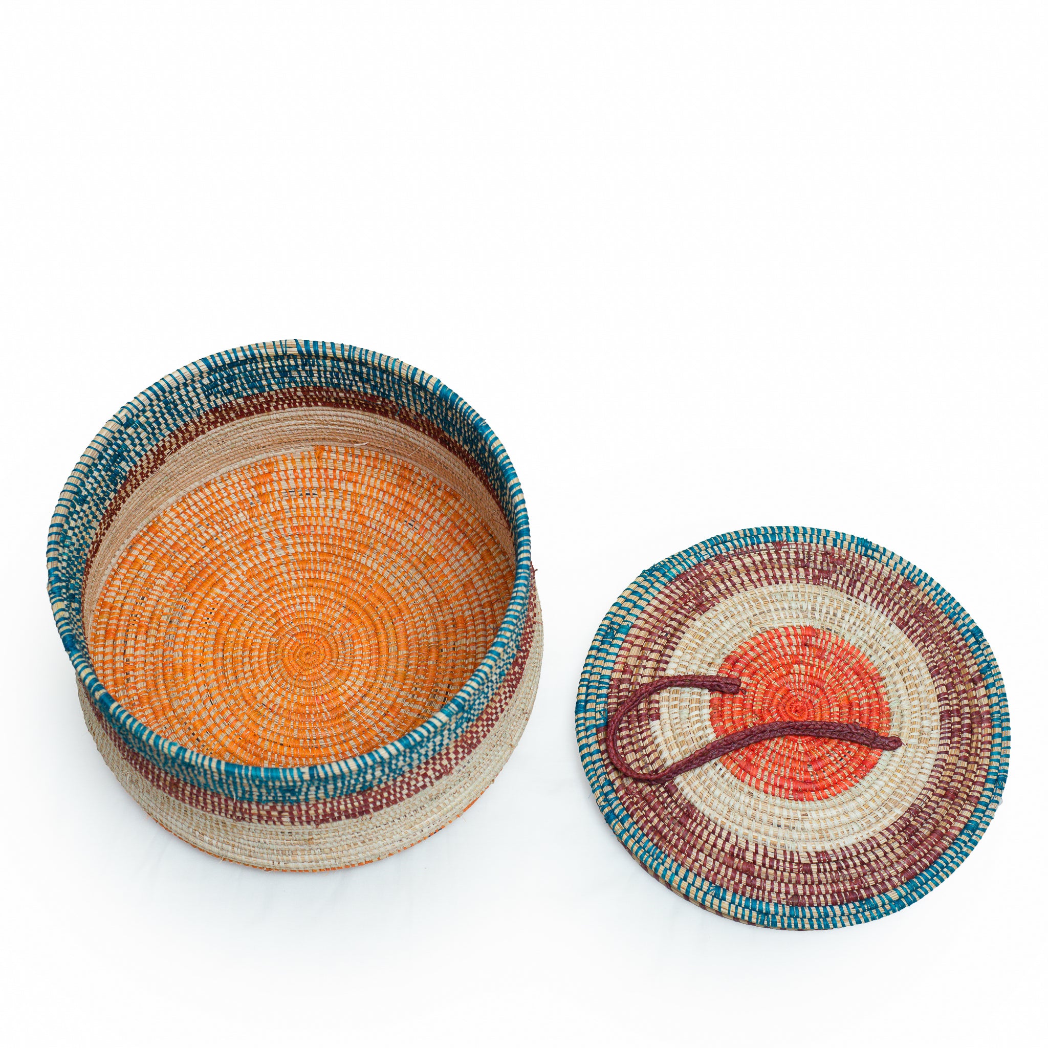 A beautifully handwoven Serengeti basket showcasing vibrant colors and authentic African design, perfect for home decor and storage.