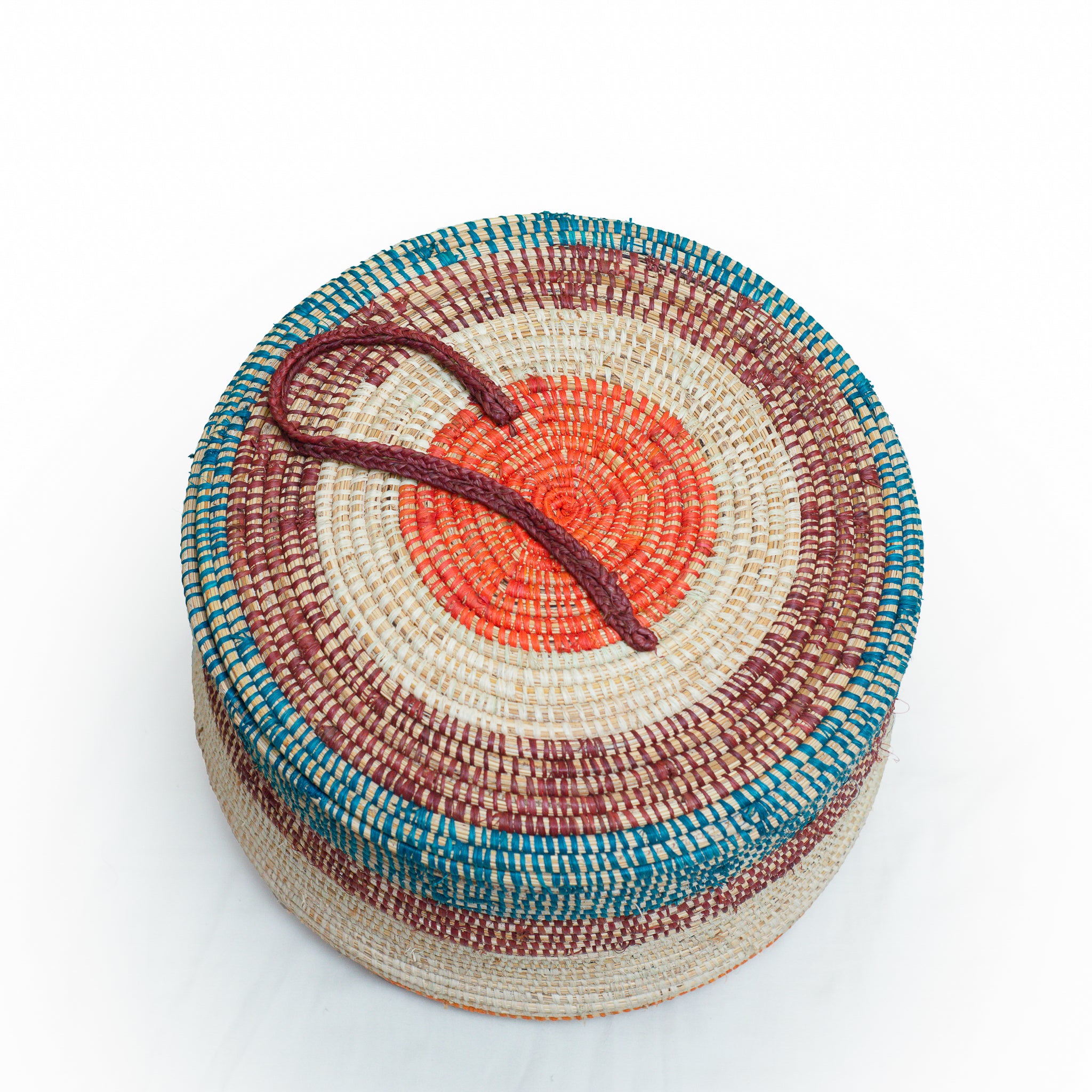A beautifully handwoven Serengeti basket showcasing vibrant colors and authentic African design, perfect for home decor and storage.