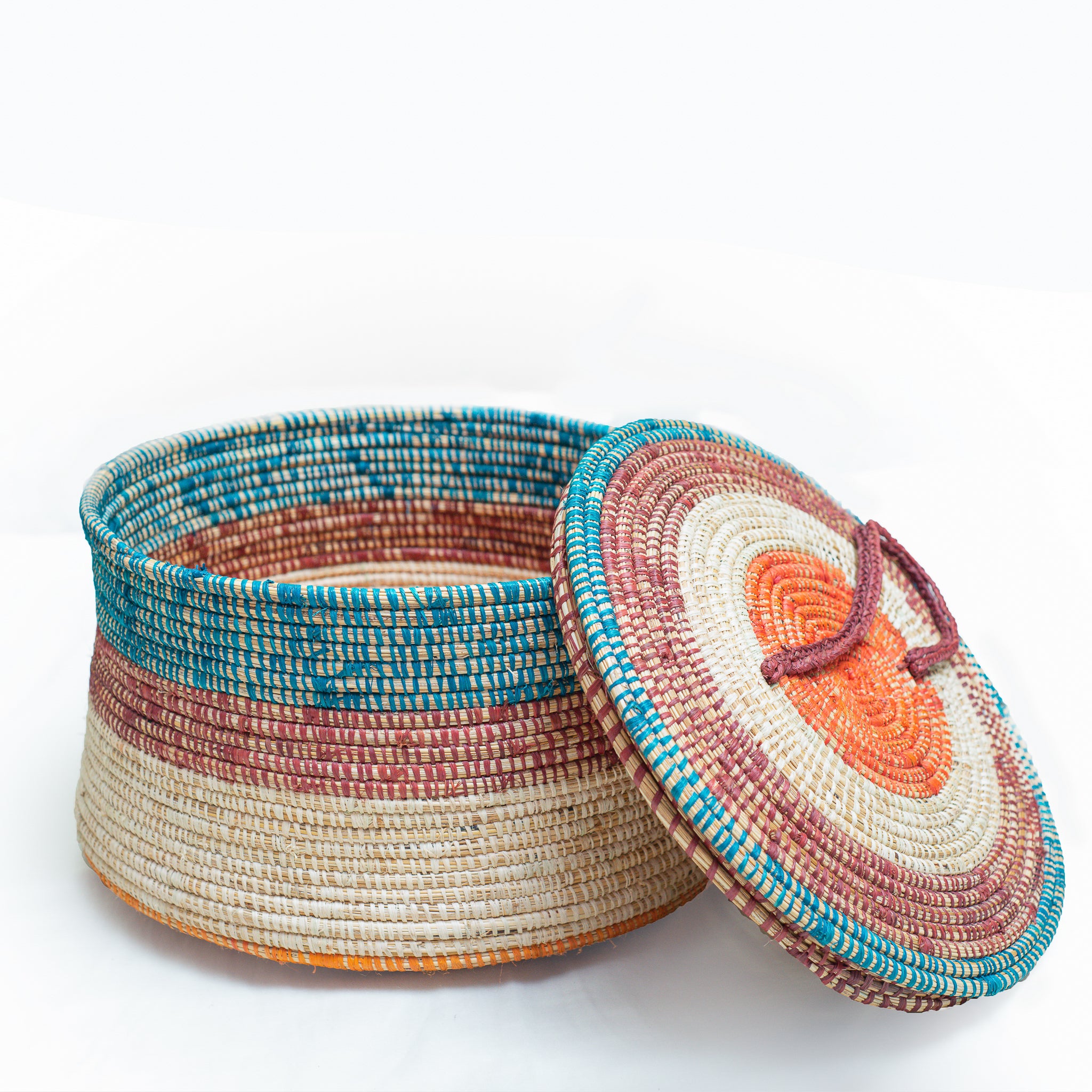 A beautifully handwoven Serengeti basket showcasing vibrant colors and authentic African design, perfect for home decor and storage.