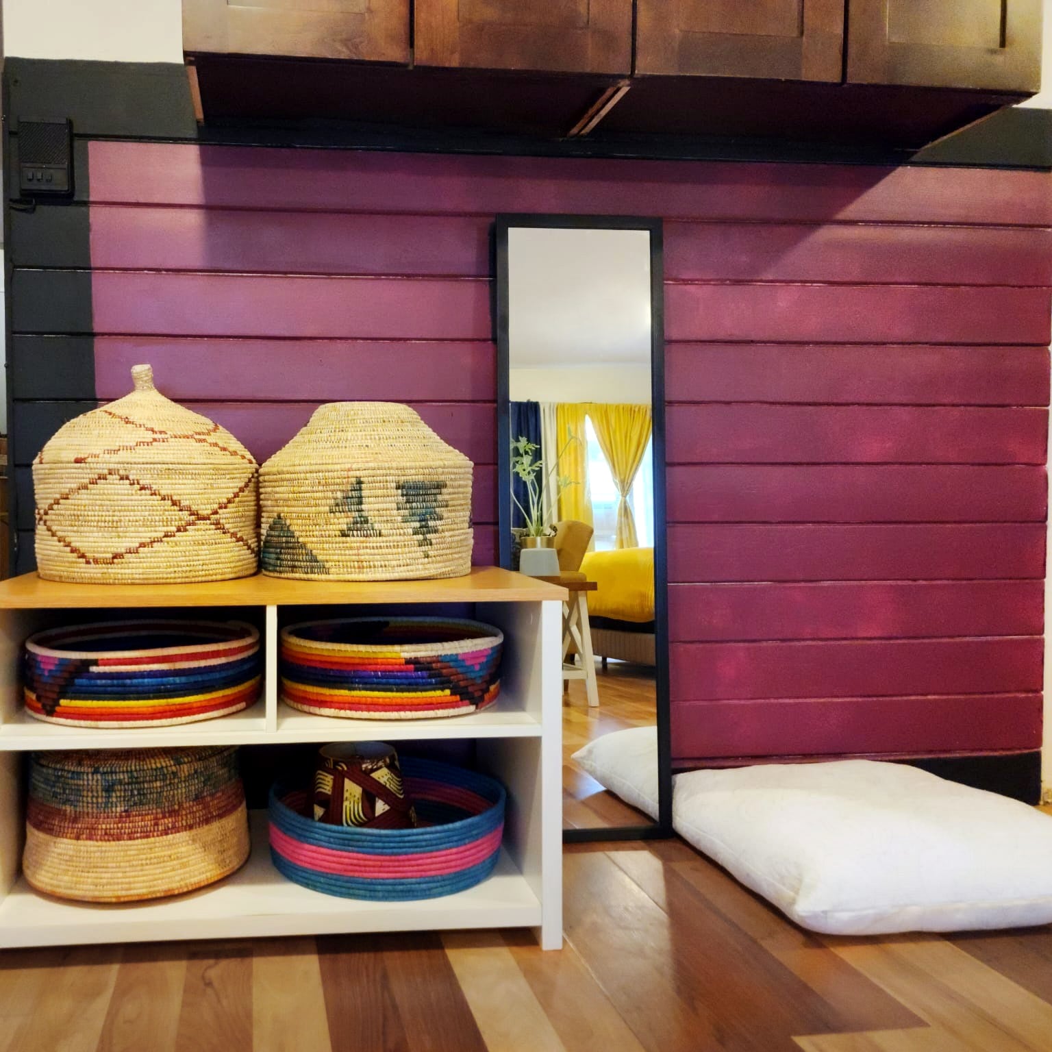 A beautifully handwoven Serengeti basket showcasing vibrant colors and authentic African design, perfect for home decor and storage.