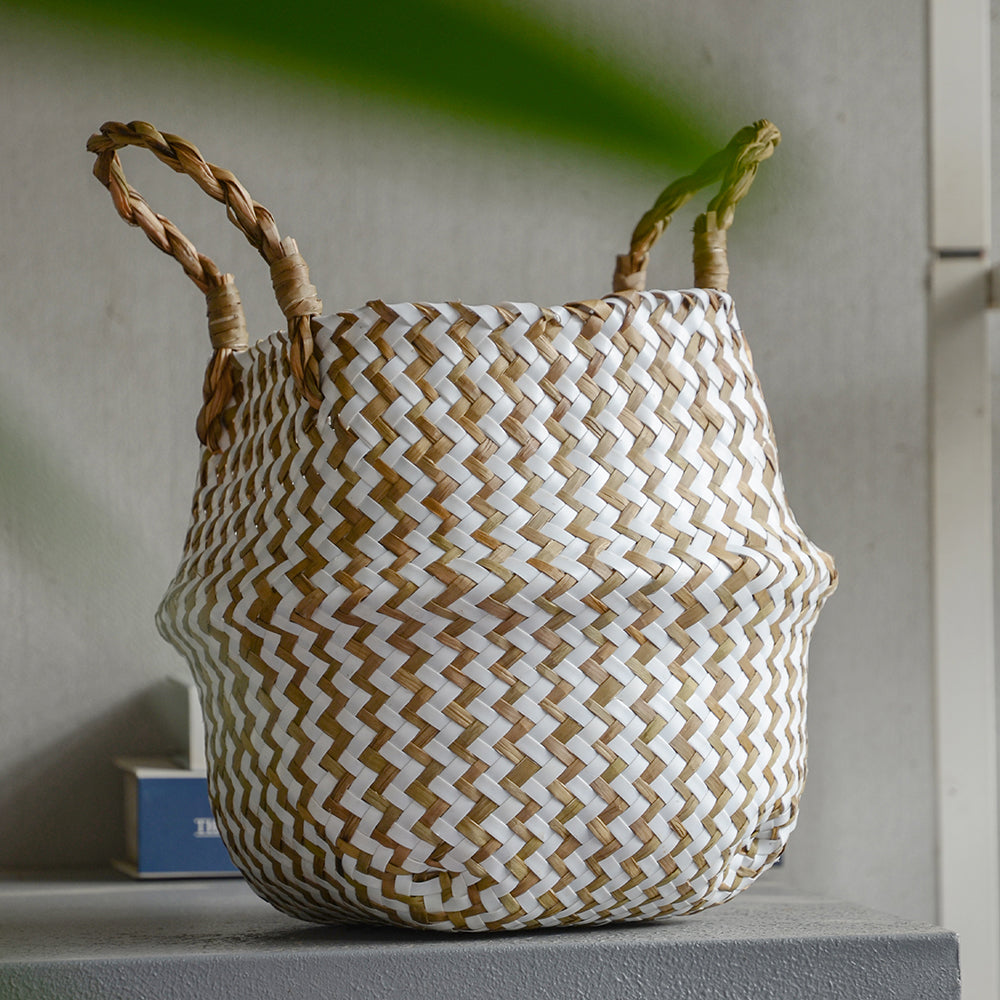 A set of stylish striped wicker storage baskets made from natural seagrass, showcasing their handcrafted design and ample storage space.