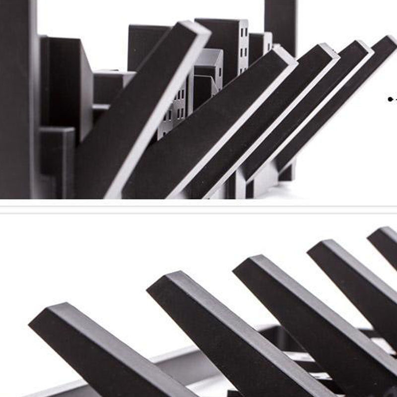 Stylish black wall-mounted coat rack with five flip-down hooks for versatile storage.