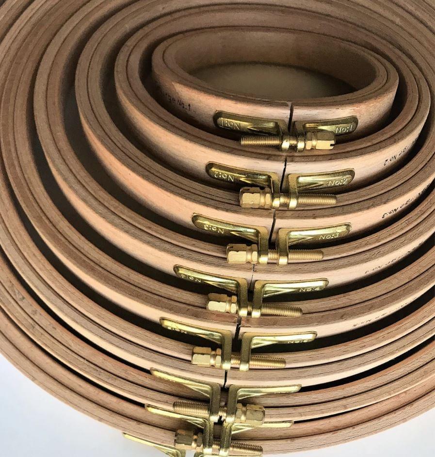 Nurge 16mm Screwed Wooden Embroidery Hoop made of beech wood with brass fittings, showcasing its smooth finish and elegant design.