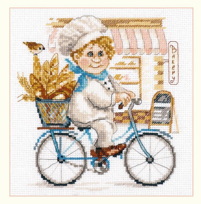 Baker 6-10 Cross-stitch kit with white Aida fabric, colorful threads, and embroidery needle.