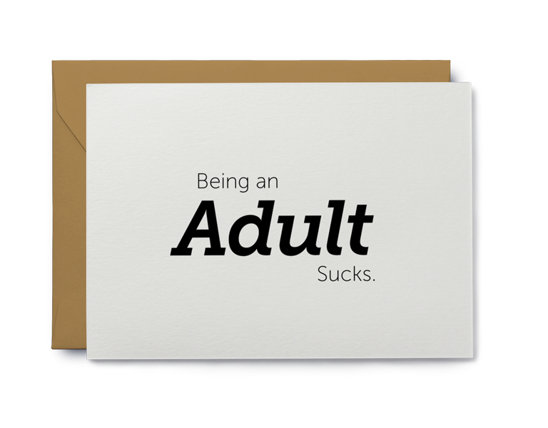A humorous birthday greeting card that reads 'Being an Adult Sucks', featuring a kraft paper envelope, designed for adults.