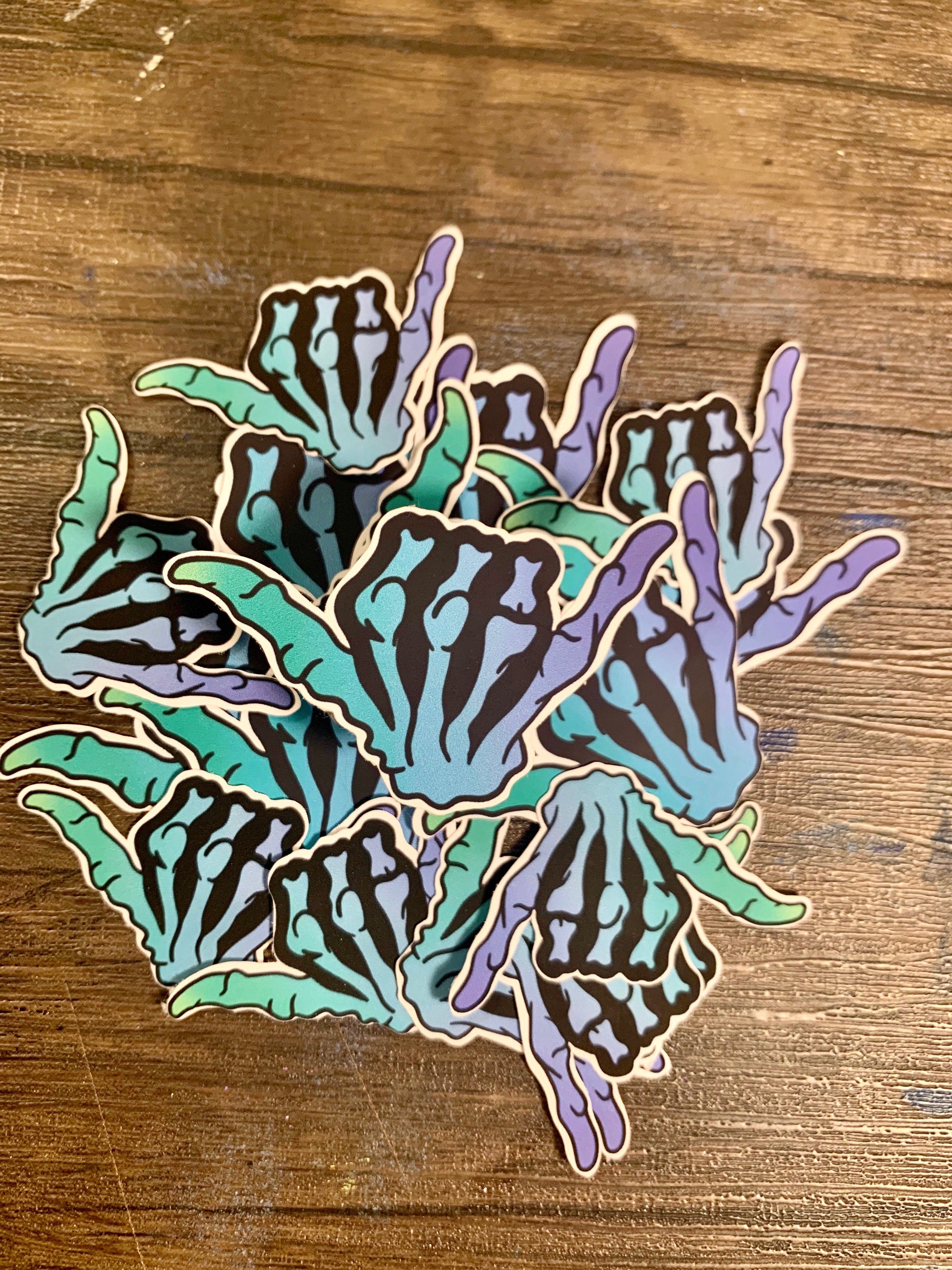 Blue gradient hang loose sticker with a shaka symbol, perfect for personalizing items like hydroflasks and laptops.