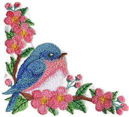 BlueBirds and Blossoms embroidered patch featuring vibrant bluebirds and floral designs on a cotton base, ideal for iron-on or sewing applications.