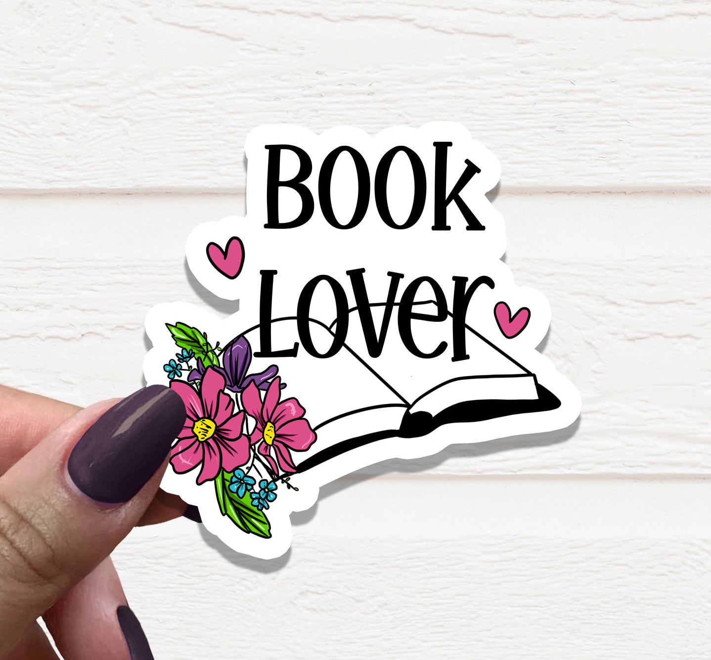A vibrant Book Lover Vinyl Sticker featuring a book design, perfect for personalizing items like laptops and water bottles.