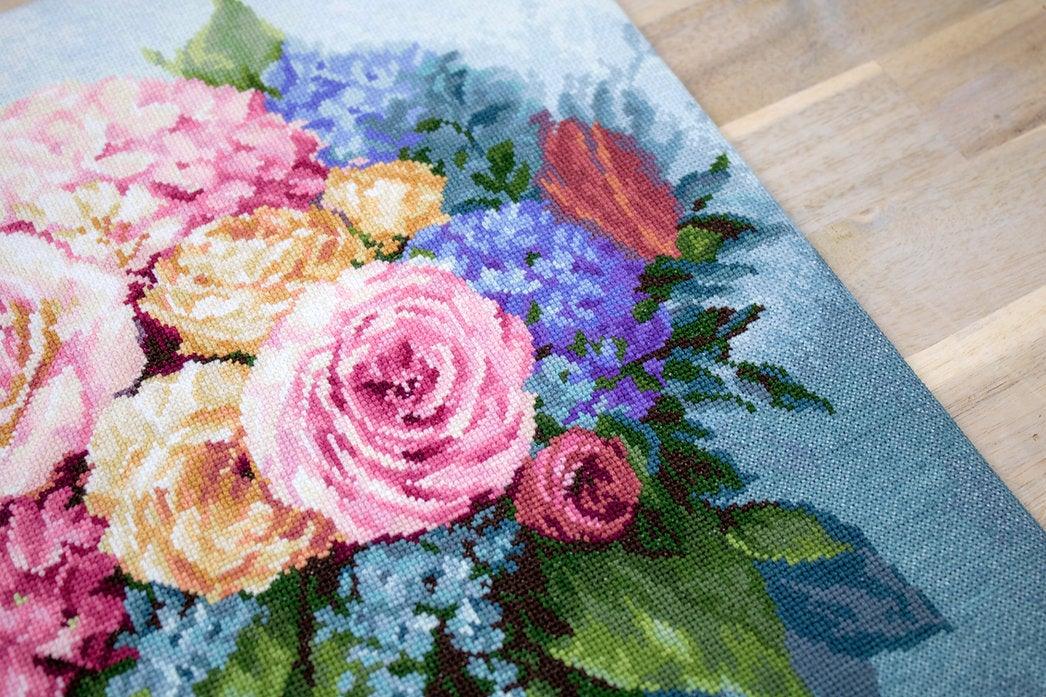 Bouquet B2371L Counted Cross-Stitch Kit featuring pink roses, yellow peonies, and blue pansies on Aida canvas.
