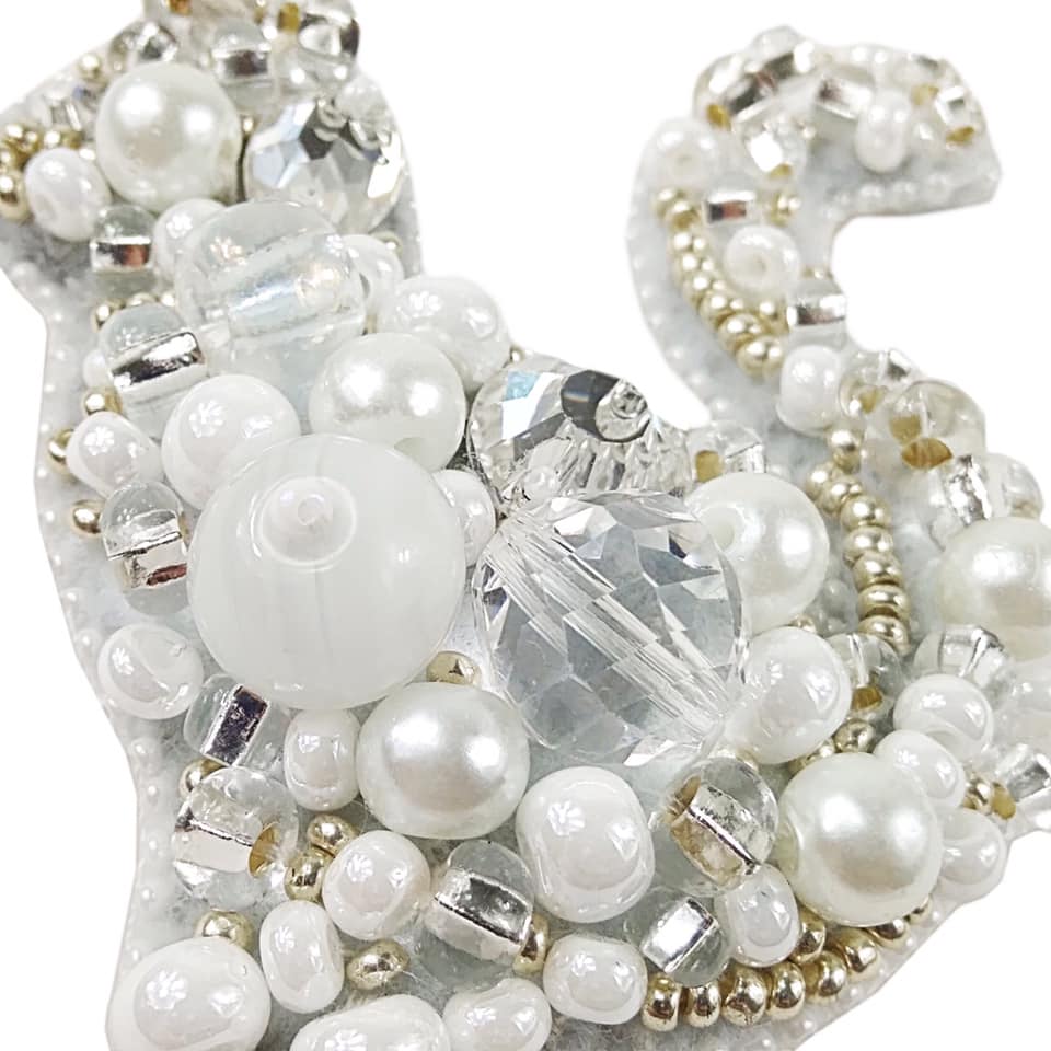 BP-220C Beadwork kit featuring colorful beads, rhinestones, and crafting materials for creating a cat brooch.