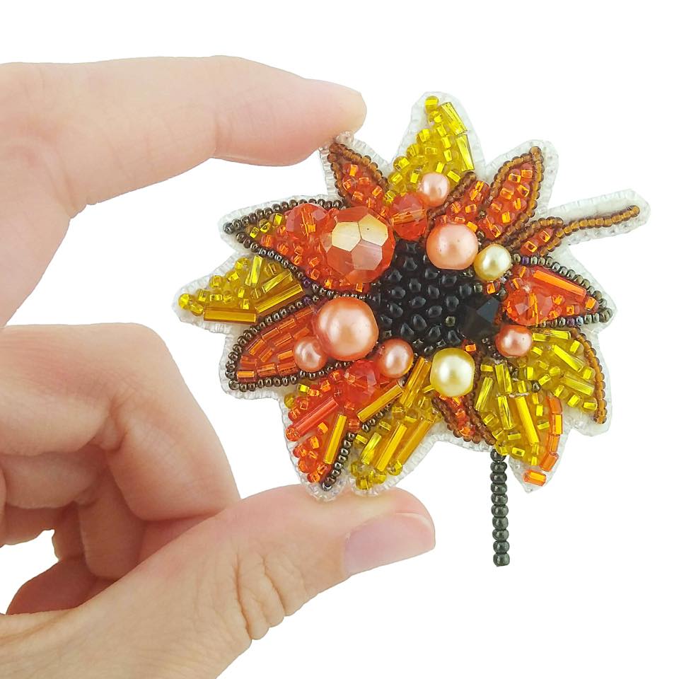 BP-228C Beadwork kit featuring colorful Preciosa and Crystal Art beads for creating a sunflower brooch.