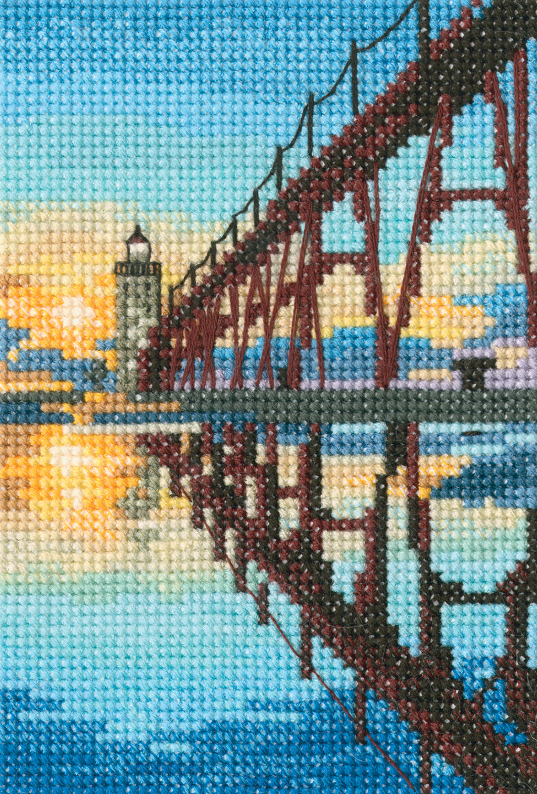 Bridge to Manistee North Pierhead Lighthouse Counted Cross Stitch kit featuring Aida 14 canvas, DMC threads, and detailed instructions.