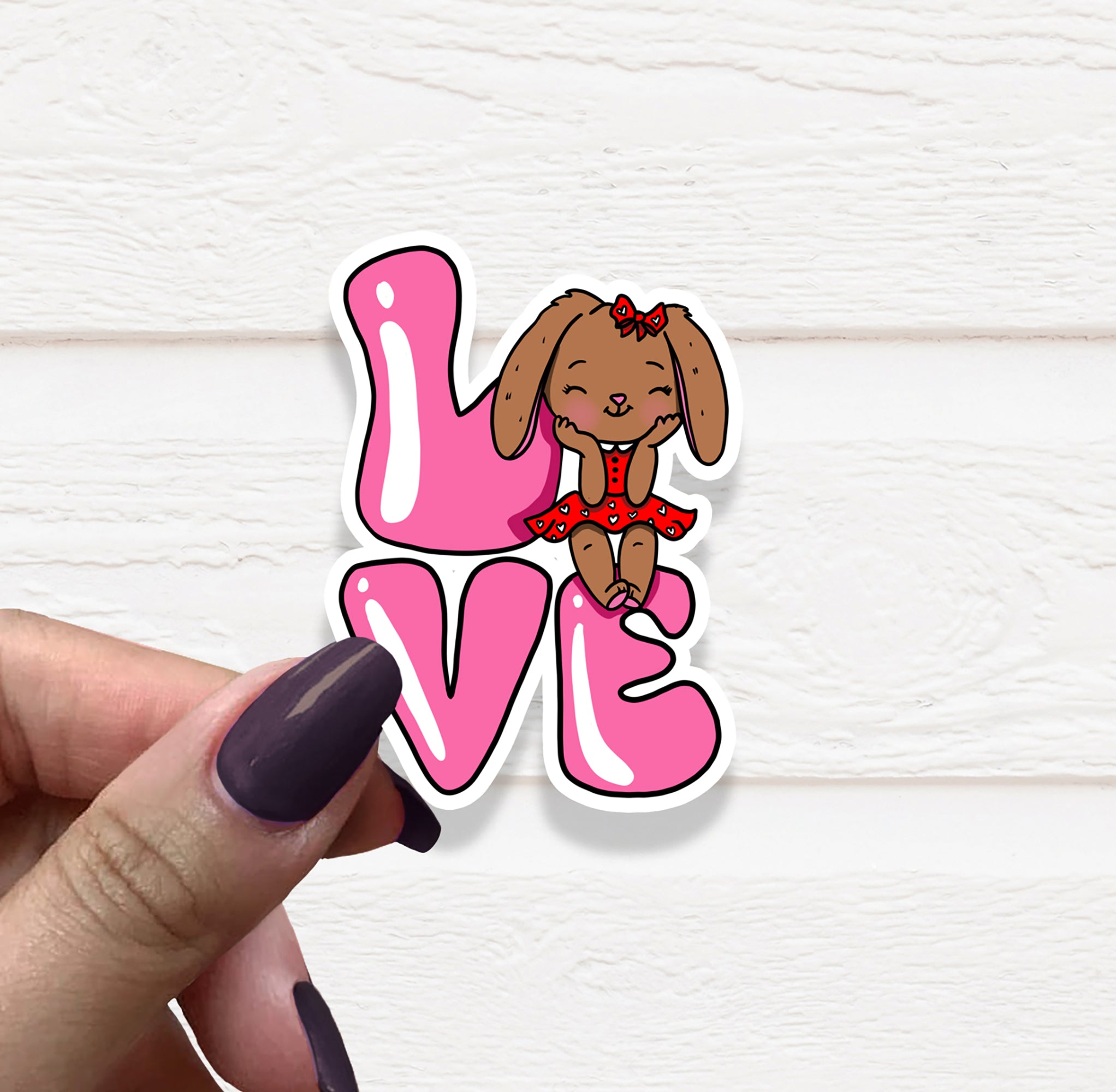 A cute Bunny Love Vinyl Sticker featuring an adorable bunny design, perfect for personalizing various items.