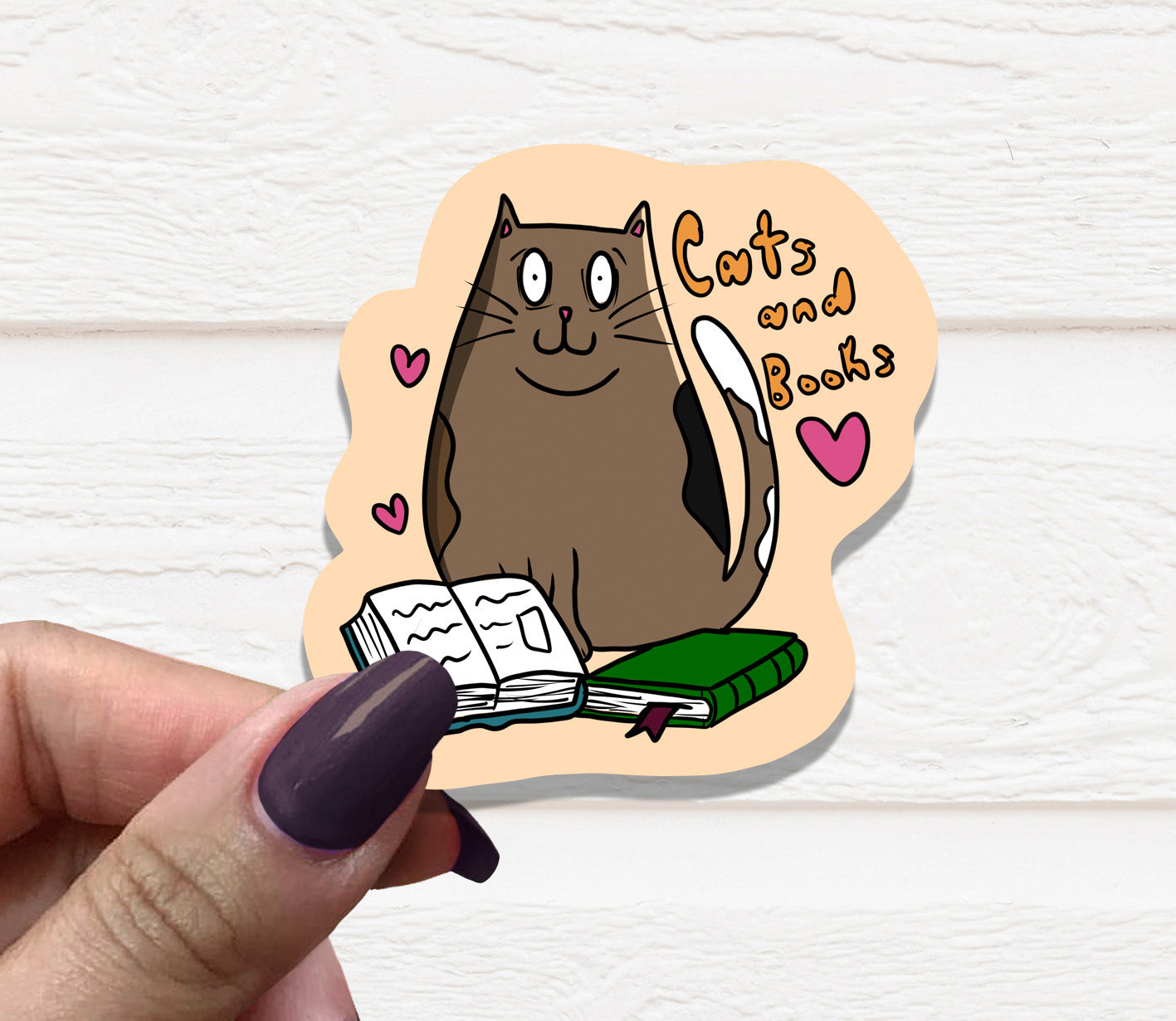 A colorful vinyl sticker featuring a cat and books, perfect for personalizing items.