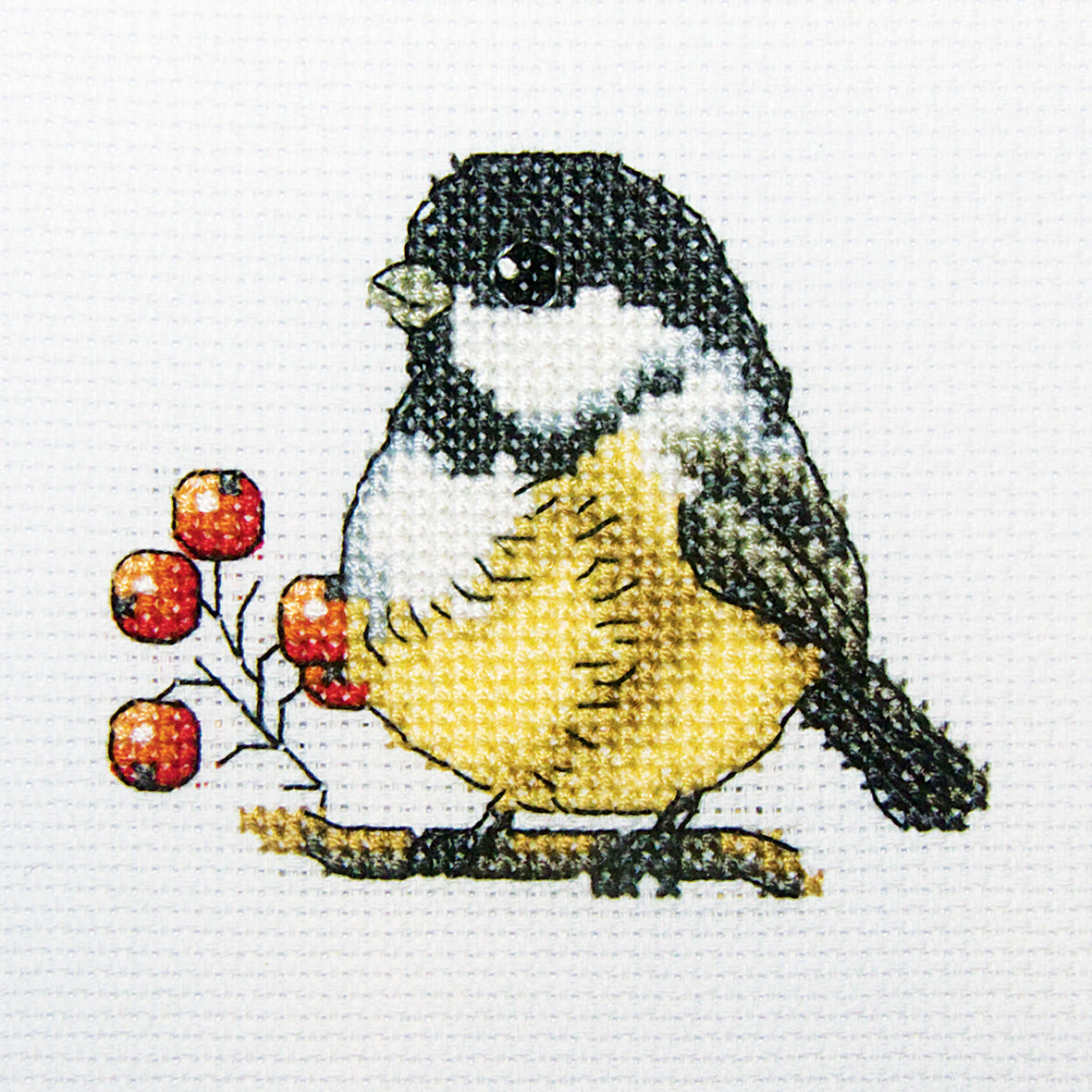 Chickadee H219 Counted Cross Stitch Kit featuring a Christmas bird design with Aida fabric and colorful threads.